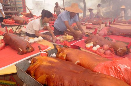 (miniature) Sacrifice de cochons en Chine