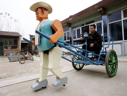 (miniature) Un agriculteur chinois construit une armée de robots