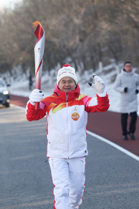 (miniature) Fu Qiang lors du relais de la flamme olympique