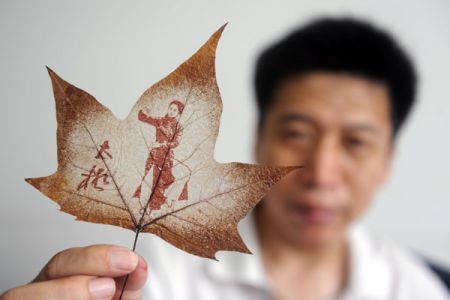 (miniature) Photos : sculptures sur feuille d'arbre de Chen Liming