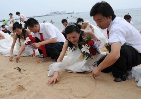 (miniature) 8 Aout 2008 : mariages groupés et bébés olympiques en Chine