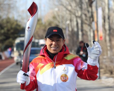 (miniature) Zhang Yimou lors du relais de la flamme olympique