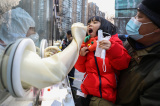 Photos (COVID-19) Chine : dpistage dans le centre de Pkin